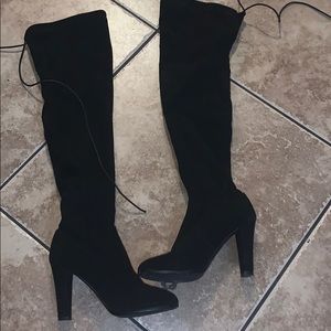 Tall black boots
